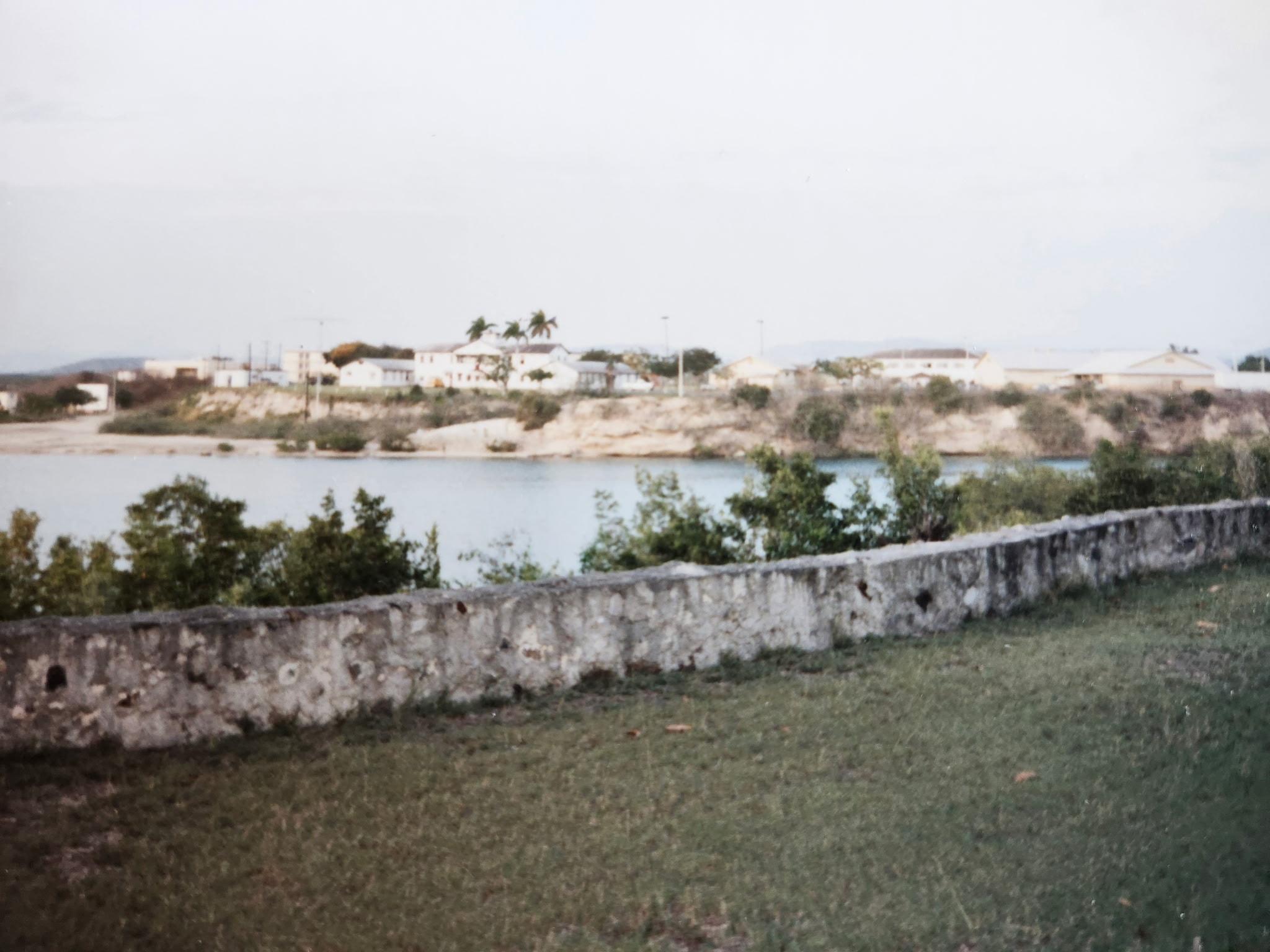Guantanamo Bay Naval Station viewed across the water from the Cuban shoreline