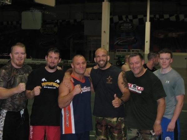 Sean O'Hara with coaches and training partners after a combat sports session